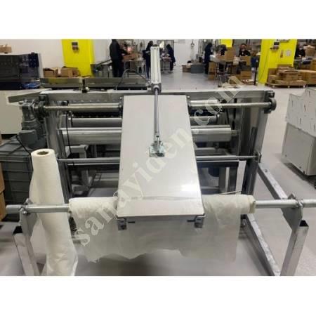 FABRIC PERFORMING MACHINE, Packing Machine