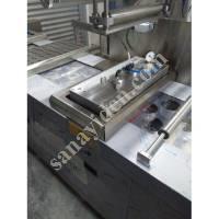 GLOBAL THERMOFORM PACKAGING MACHINES, Packing Machine
