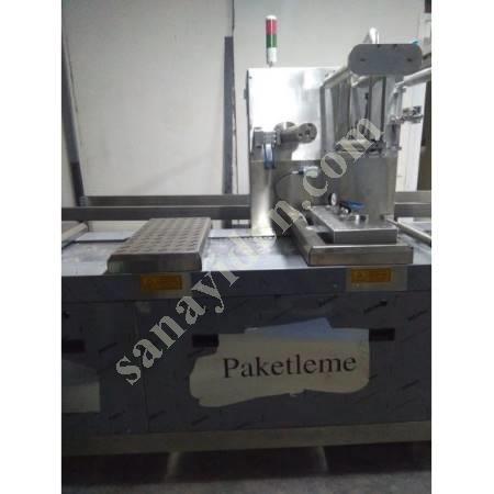 GLOBAL THERMOFORM PACKAGING MACHINES, Packing Machine