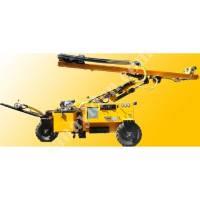 ROCK DRILLING MACHINE WITH RUBBER,